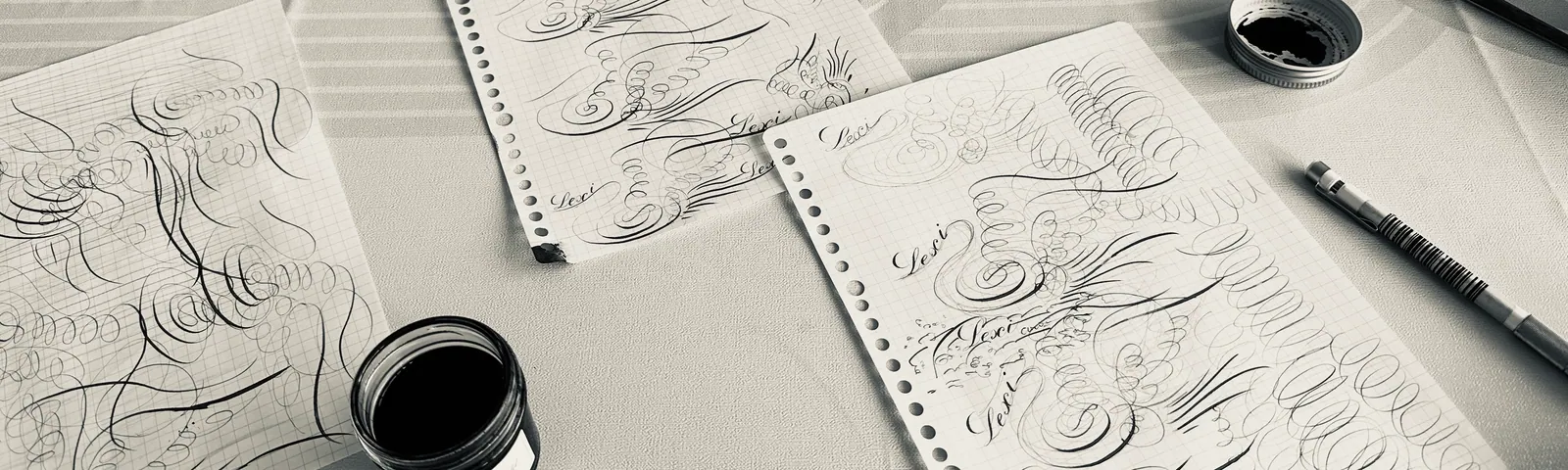 Calligraphy tools and practice sheets by Olivia Feng
